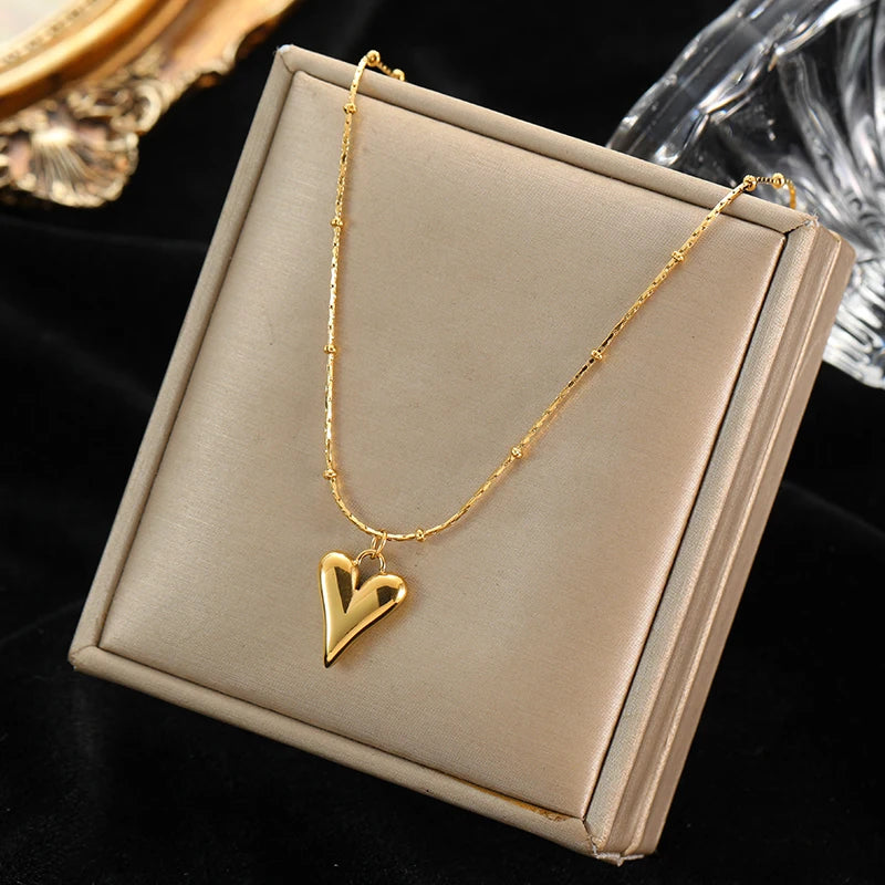 Colar Feminino em Aço Inoxidável 316L Dourado com Pingente de Esferas Vazadas