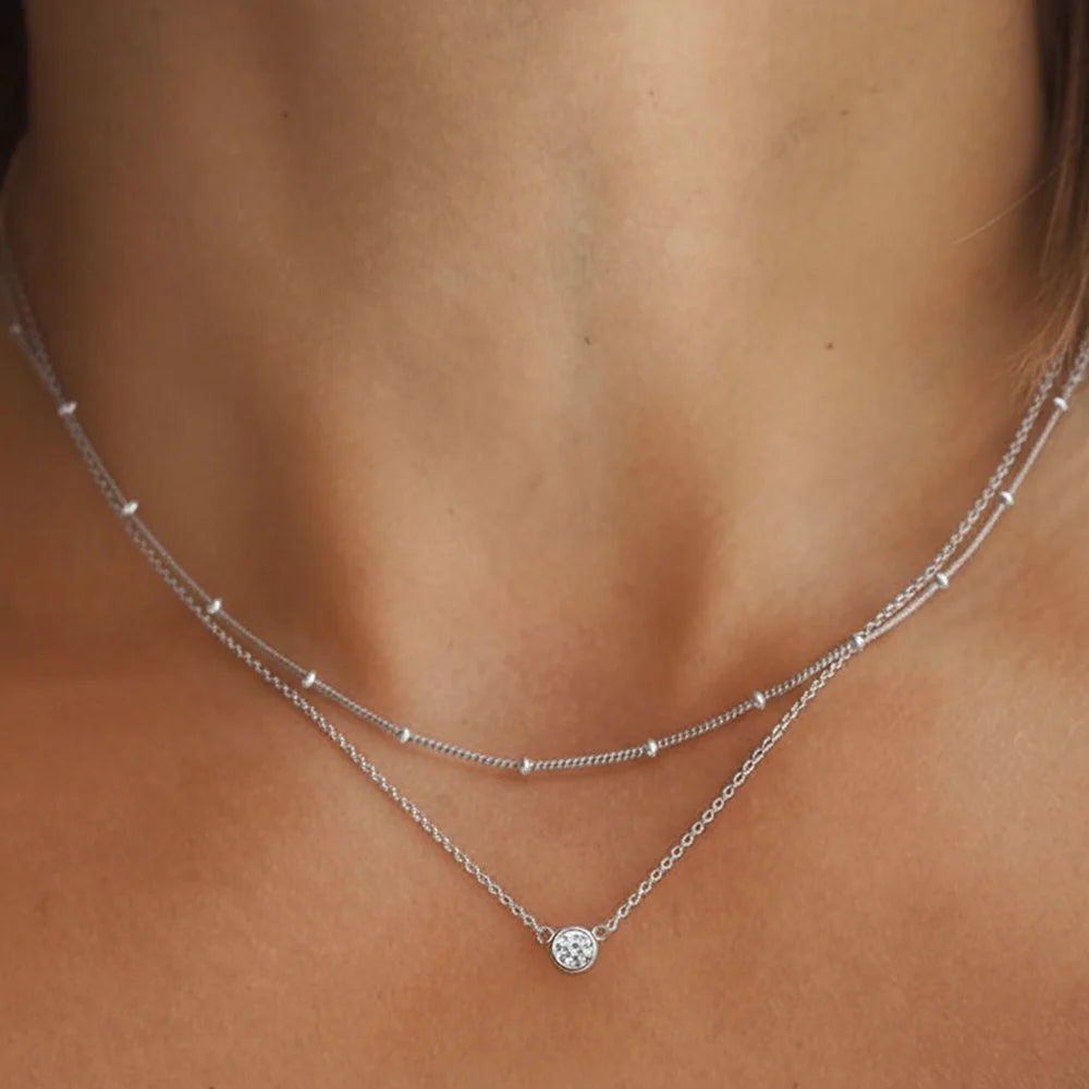 Colar Feminino Duplo em Aço Inoxidável com Pingente de Zircônia e Design Elegante