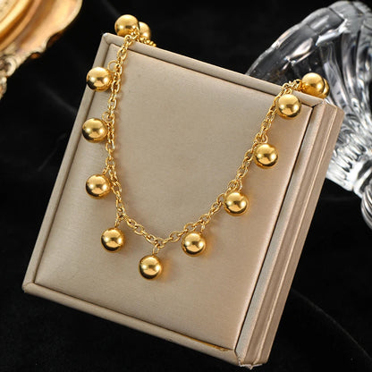 Colar Feminino em Aço Inoxidável 316L Dourado com Pingente de Esferas Vazadas